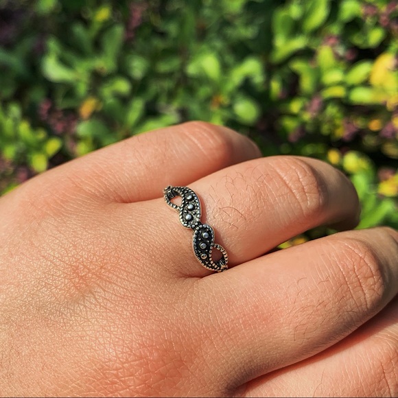 silver swirly ring